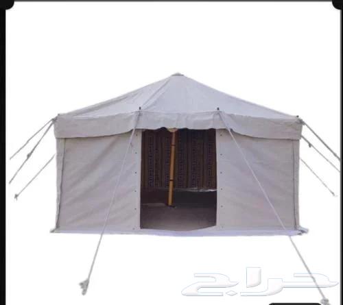 Two-pole tent, one-pole tent, and a canopy from Al-Qadi64447652671234113