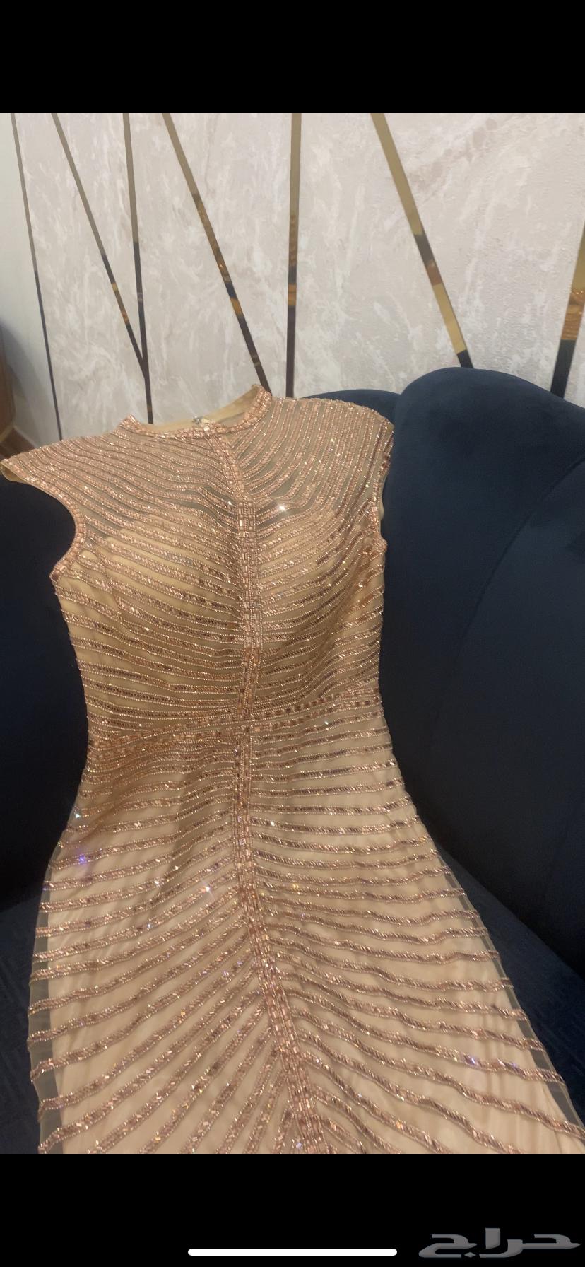فستان على شكل حورية مشكوك خرز لون بيج على وردي فاتح64438941867905114