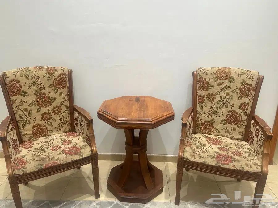 Two chairs and a table64447468308227110