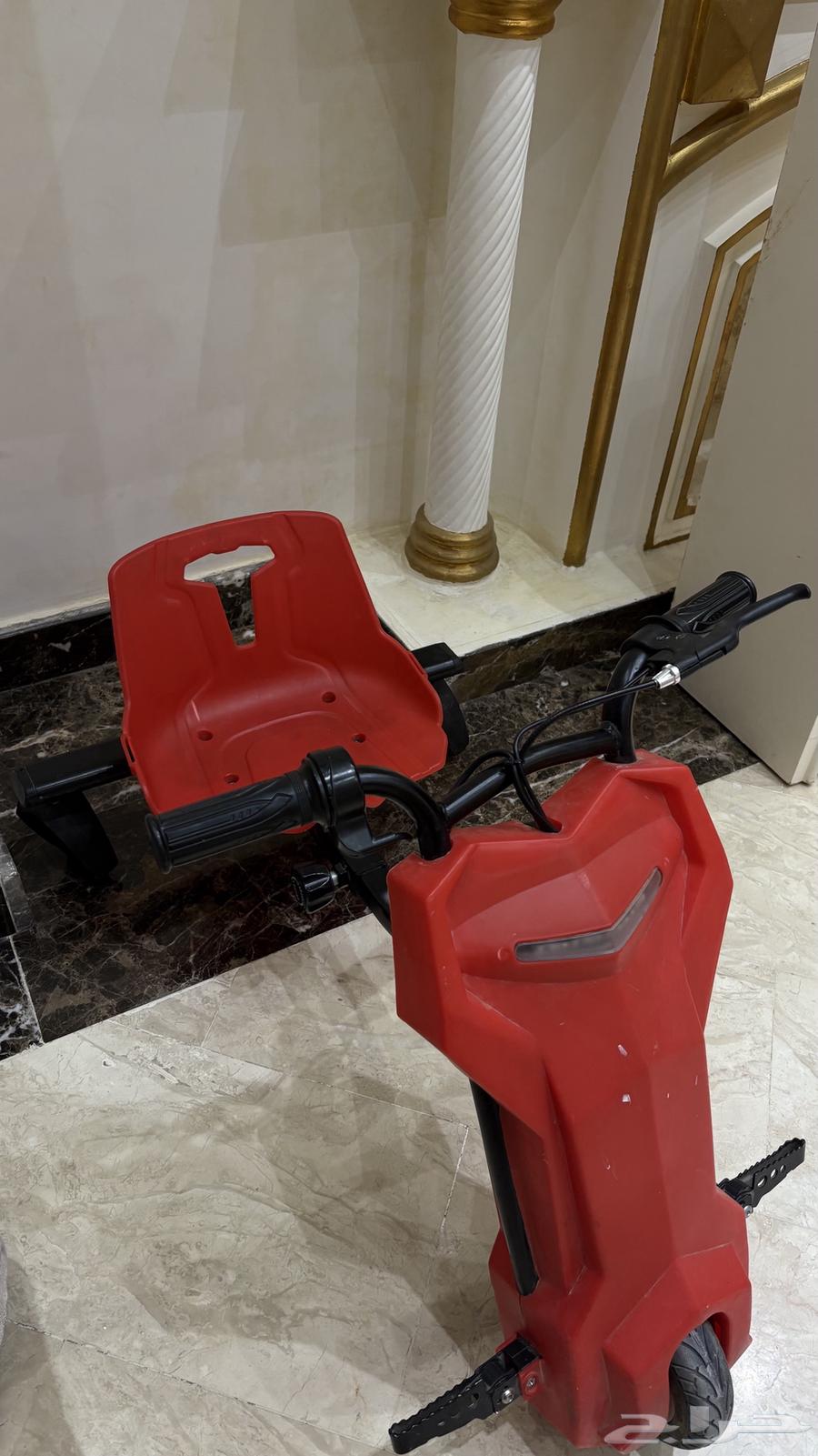 سكوتر كهربائي بلون احمر64467270867074111