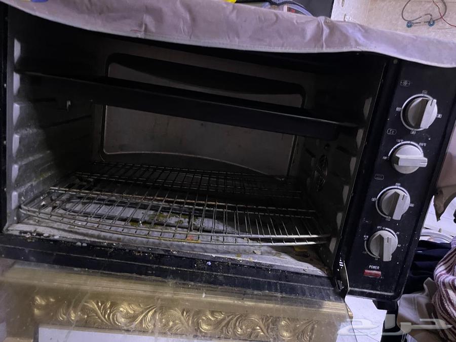 An electric oven and also a complete normal oven in perfect condition with no issues64452644352259110