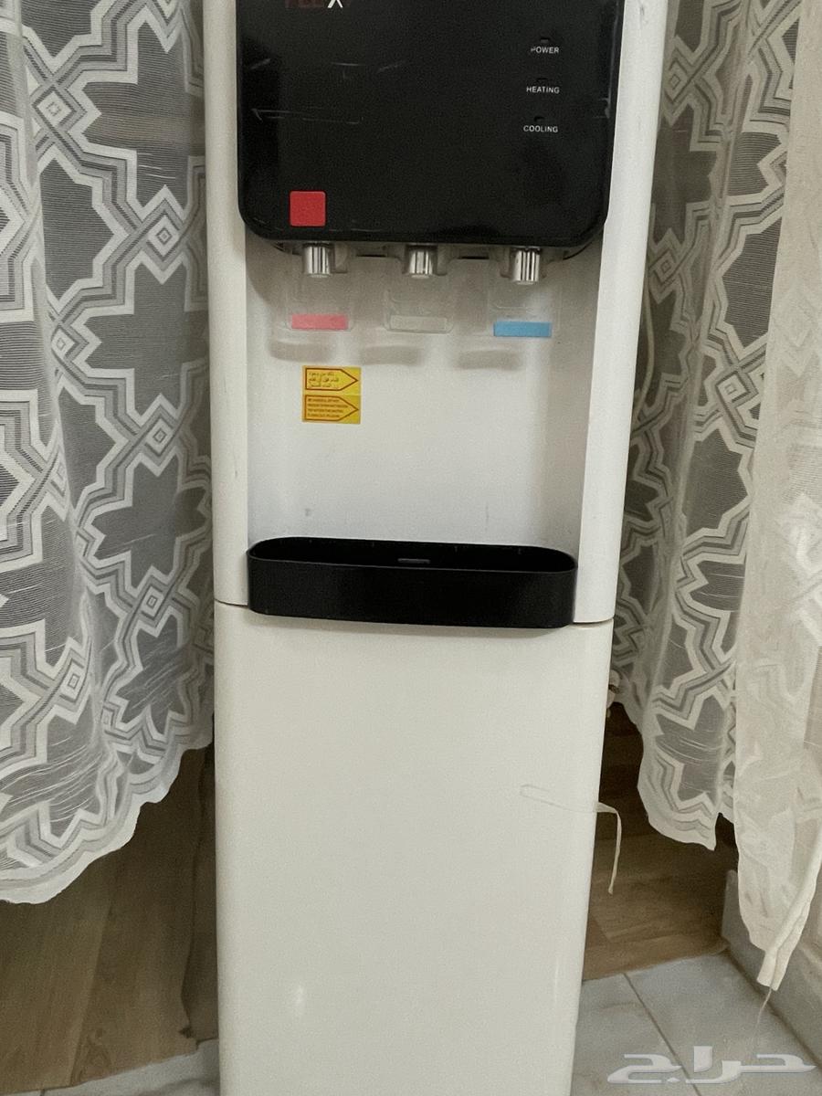 برادة ماء و ثلاجة بداخلها .64454222041347111