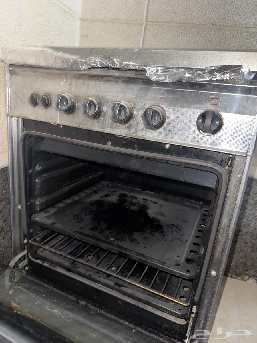 An electric oven and also a complete normal oven in perfect condition with no issues64452644352259114