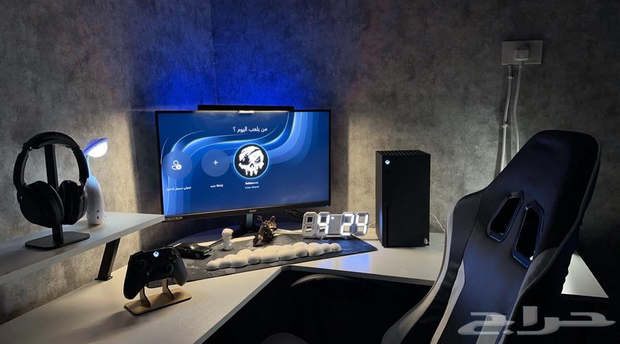 Complete setup with Xbox X console, gaming chair, and L-shaped table64454095864706110