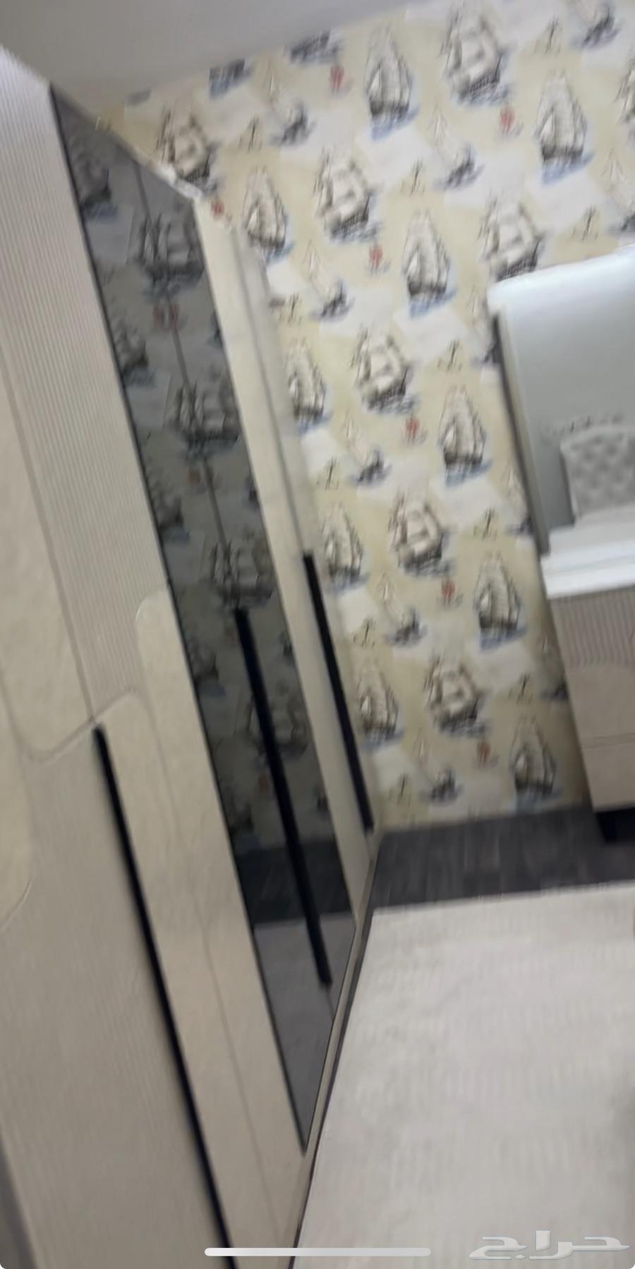 A complete bedroom set, one year old with no scratches, priced at 350064452888748291110