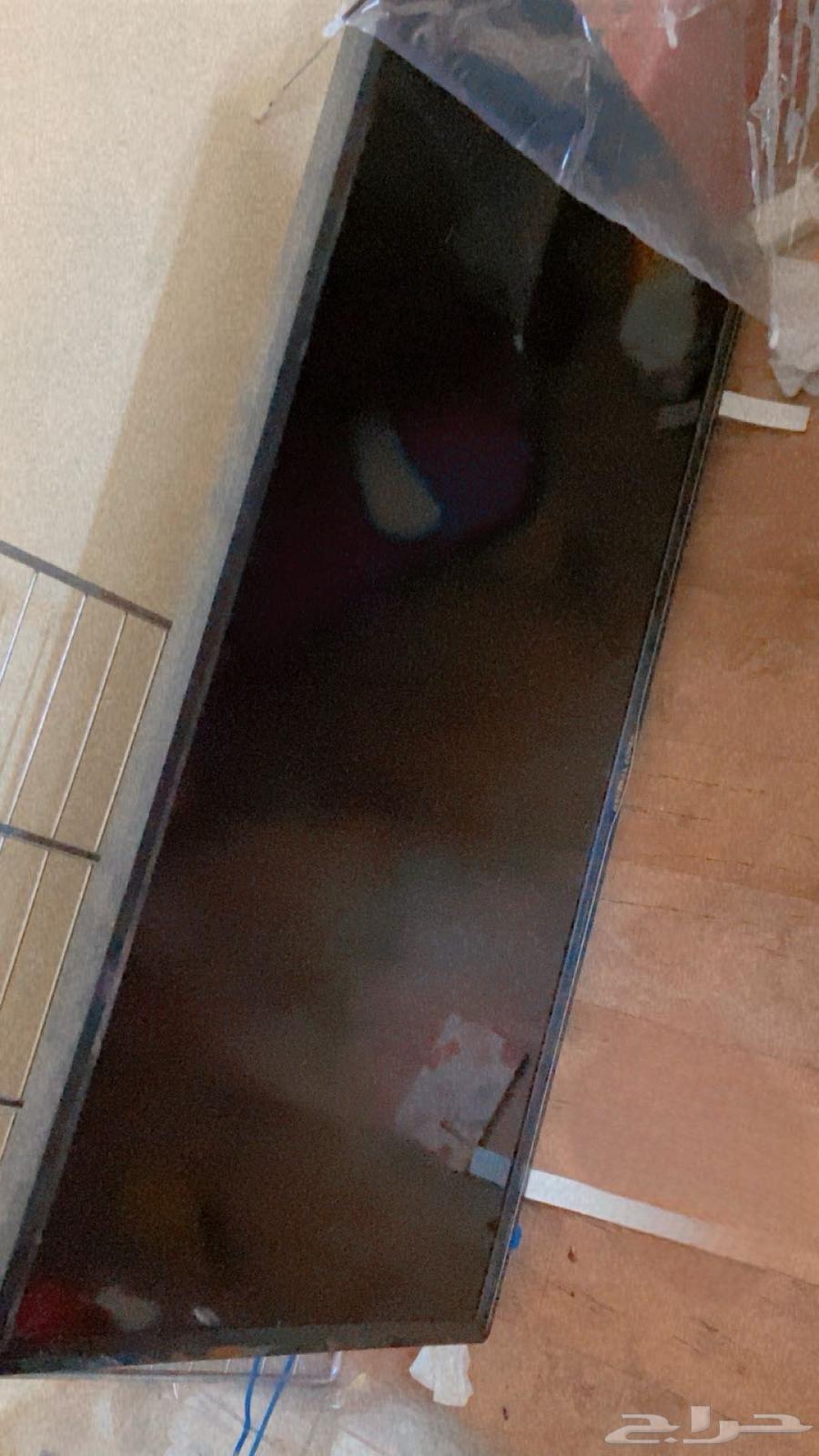 A cabinet, a TV, and a washing machine in good condition for sale64462403508611112