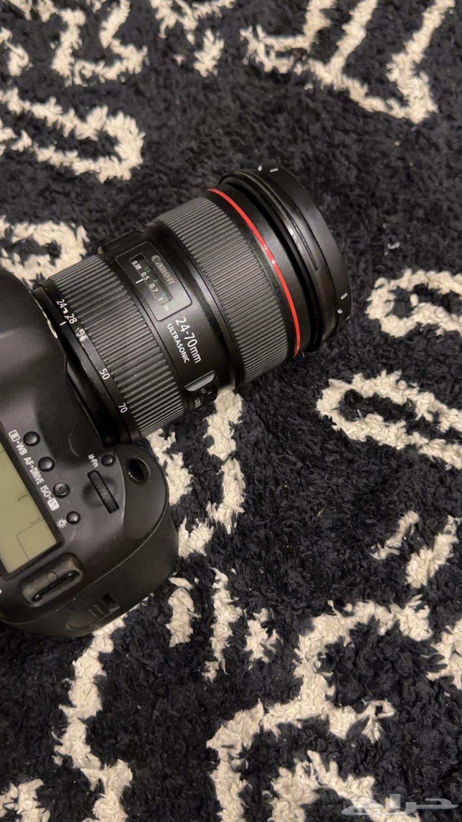 عدسة 24-70 شبه جديد64457309439746111