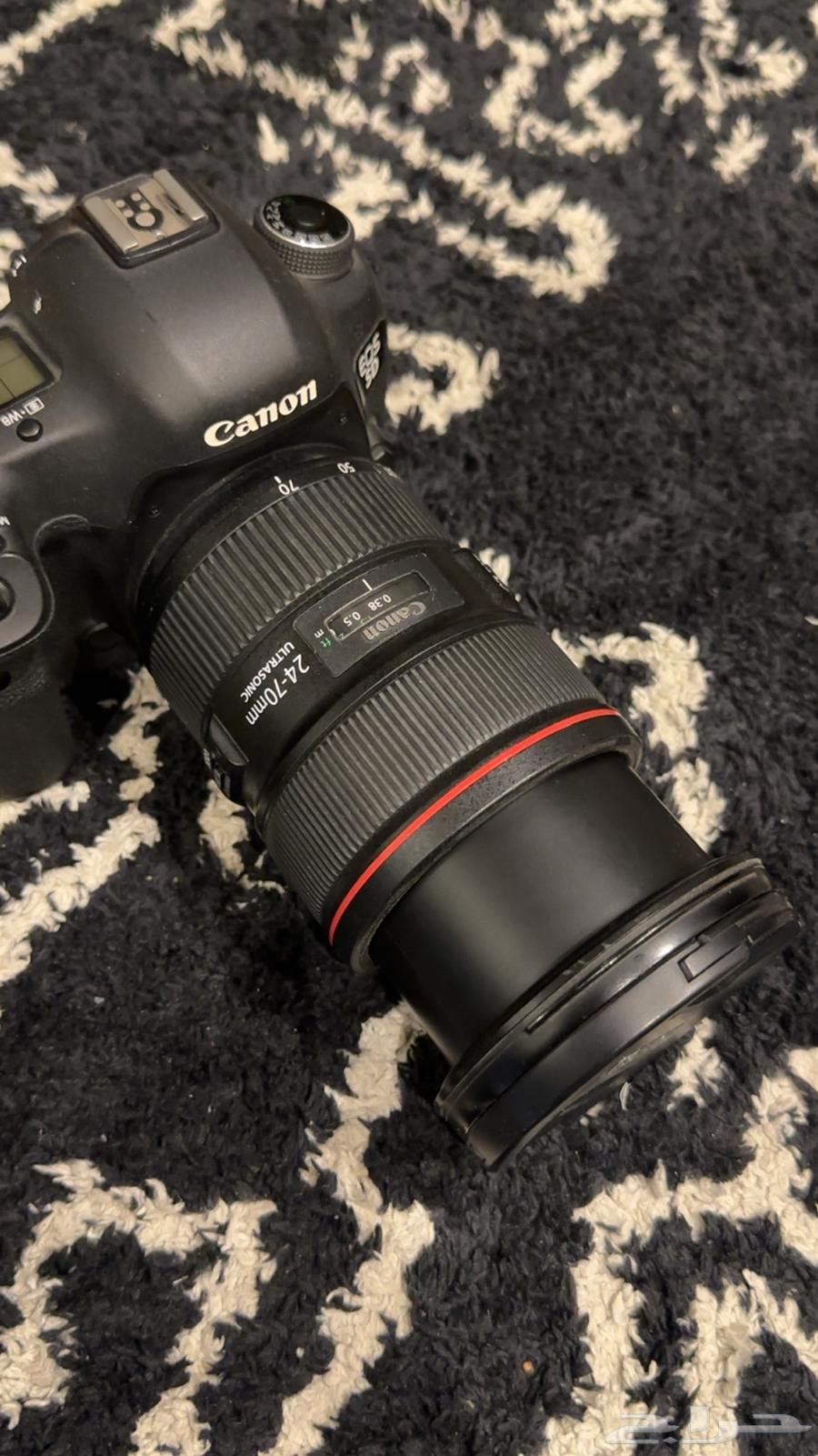 عدسة 24-70 شبه جديد64457309439746110