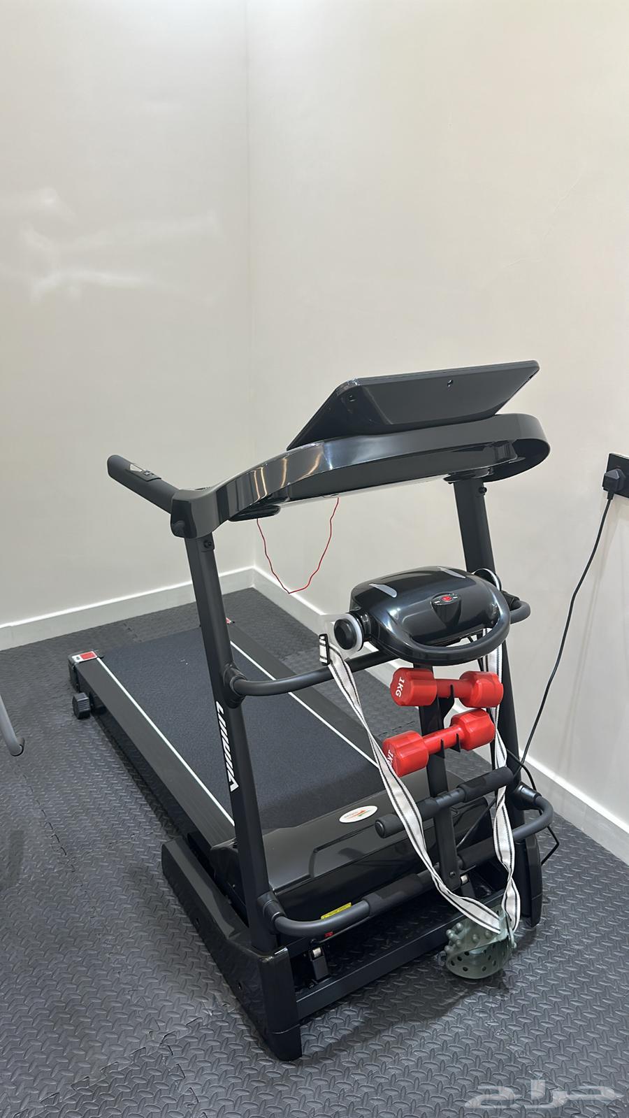 A gym consisting of four devices with their accessories64462308390915112