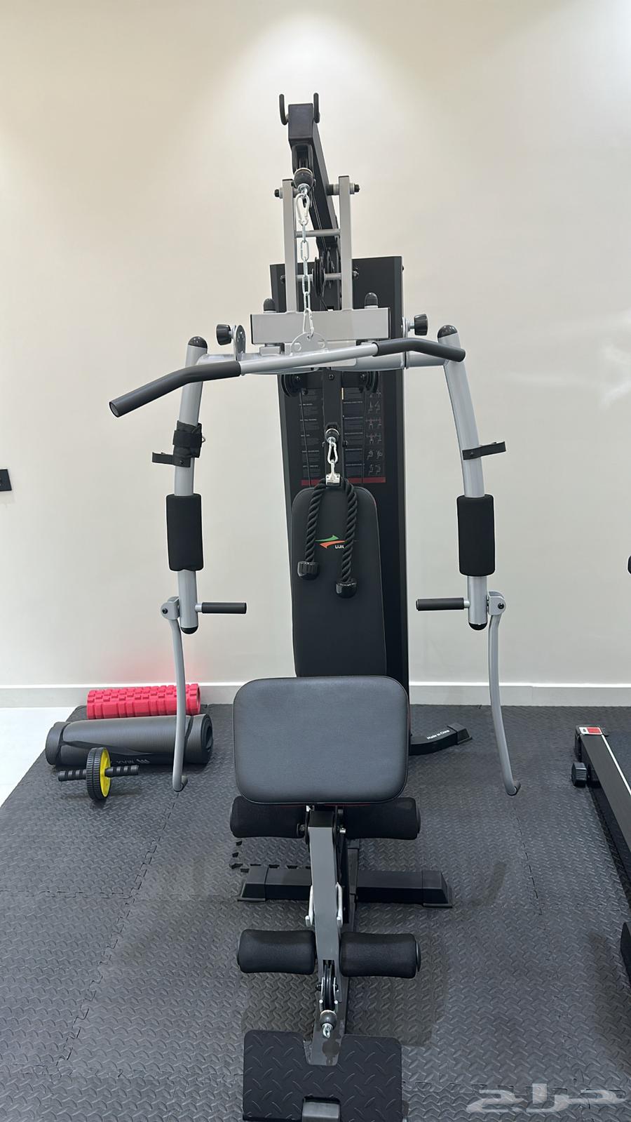 A gym consisting of four devices with their accessories64462308390915111