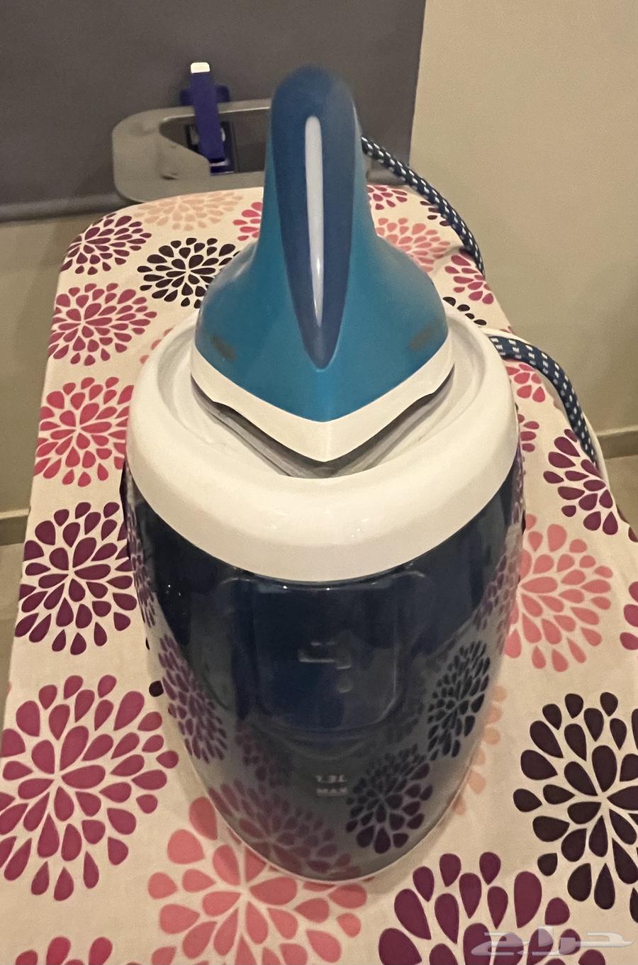 مكواة بخار و قاعدة شاحن لا سلكيه64459898972930113