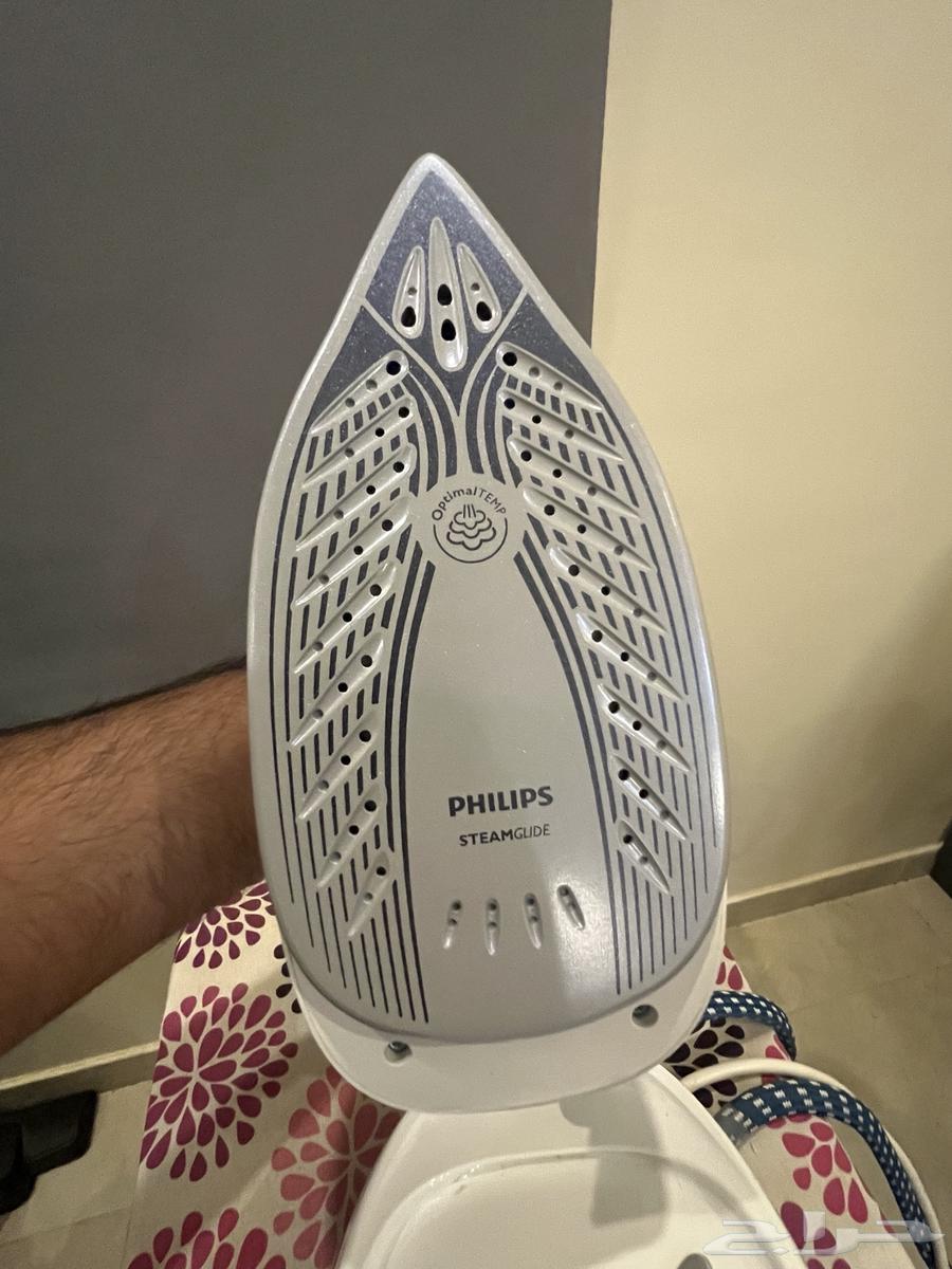 مكواة بخار و قاعدة شاحن لا سلكيه64459898972930114