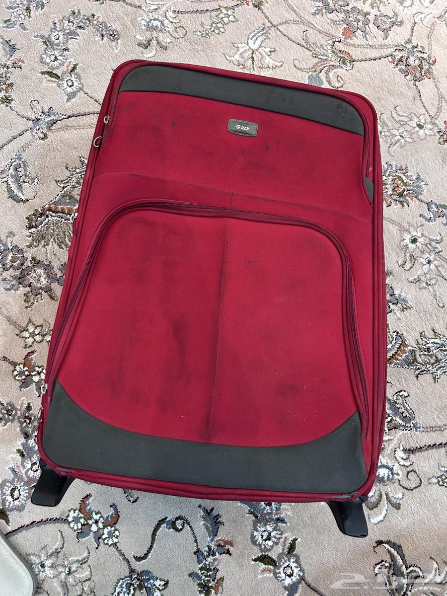 شنطة سفر حمراء 25 كيلو تقريبا64459334587906113