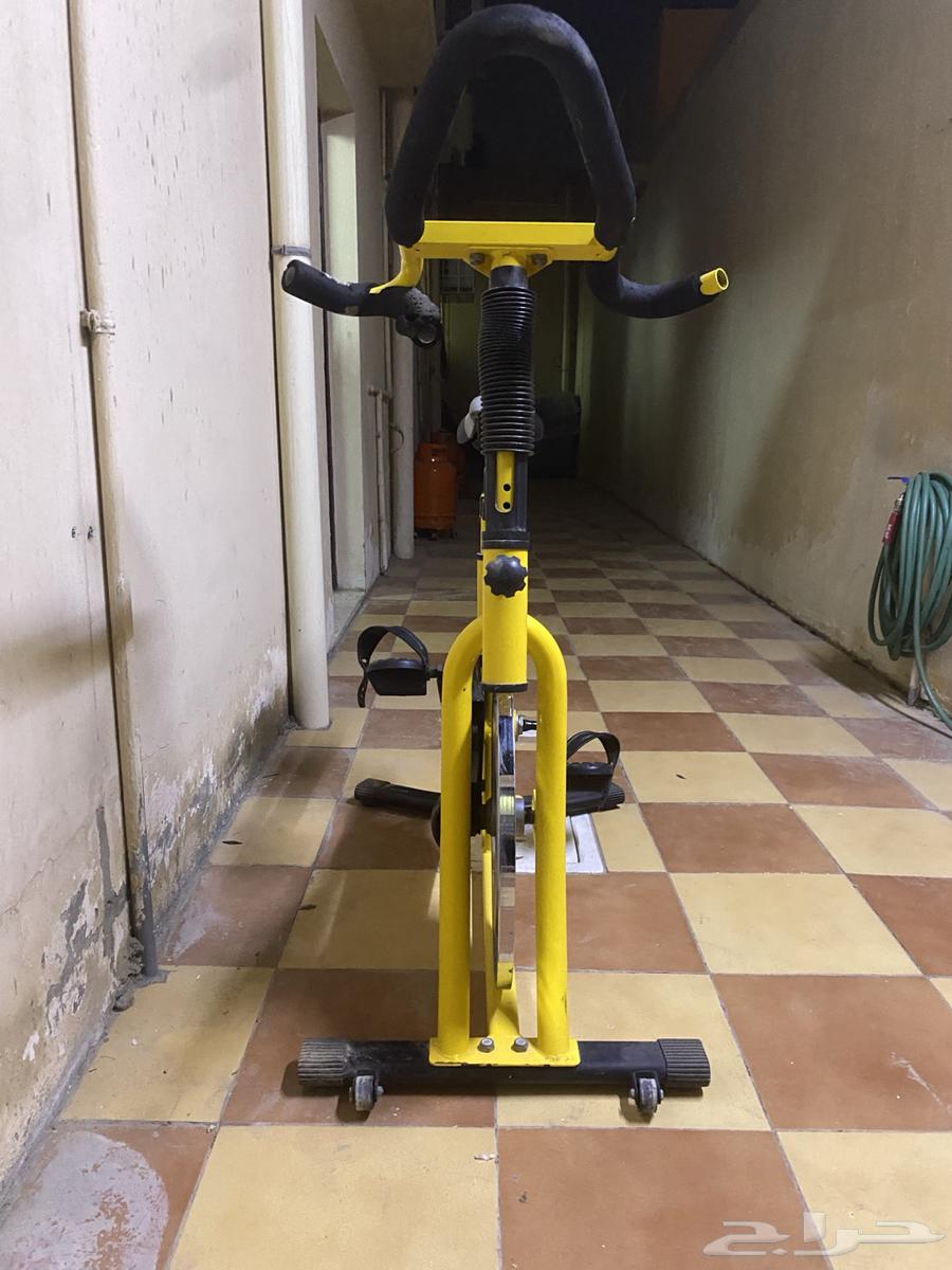Yellow exercise bike with exercise speed strength gauge64462678926849113
