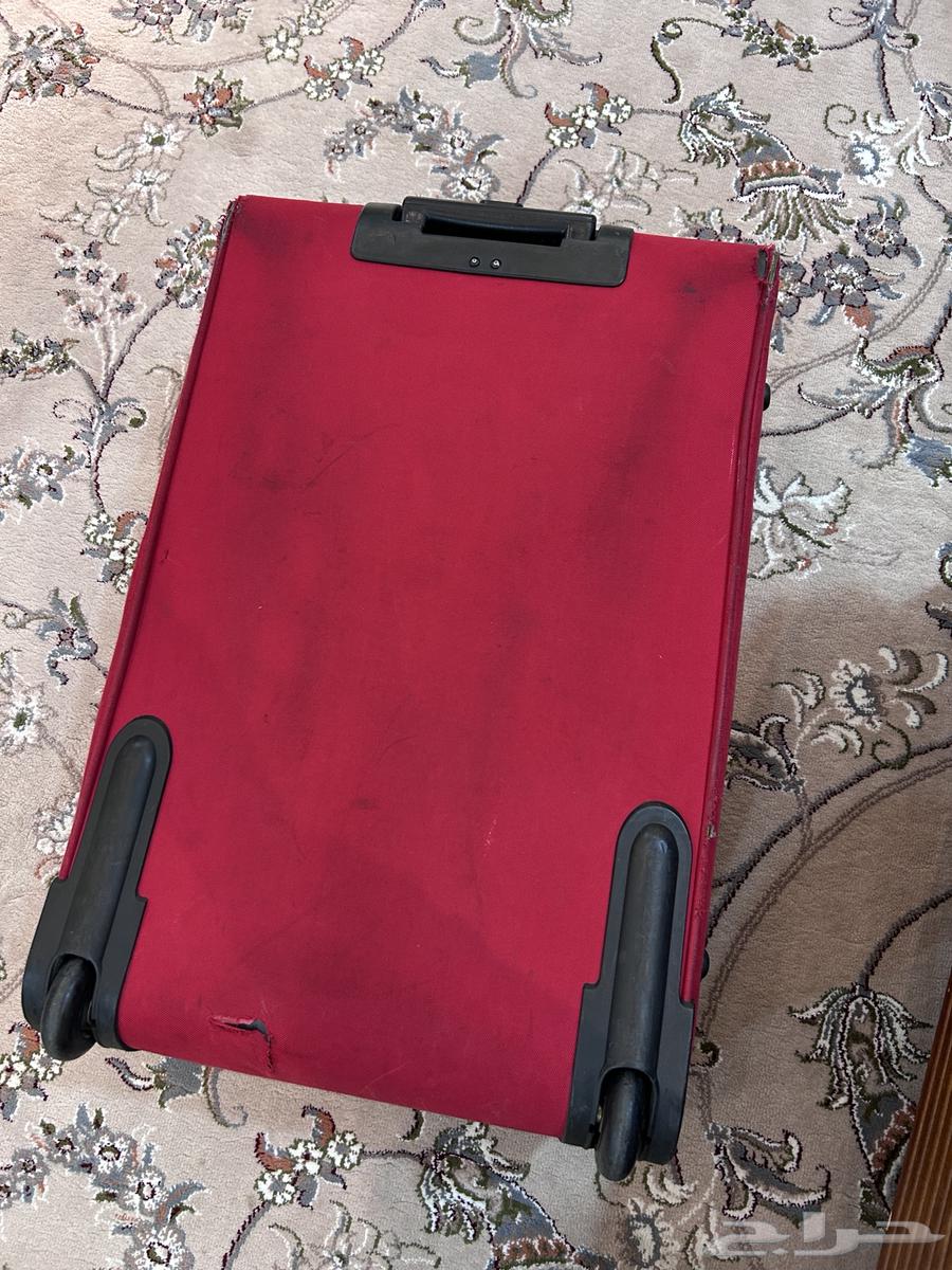 شنطة سفر حمراء 25 كيلو تقريبا64459334587906112