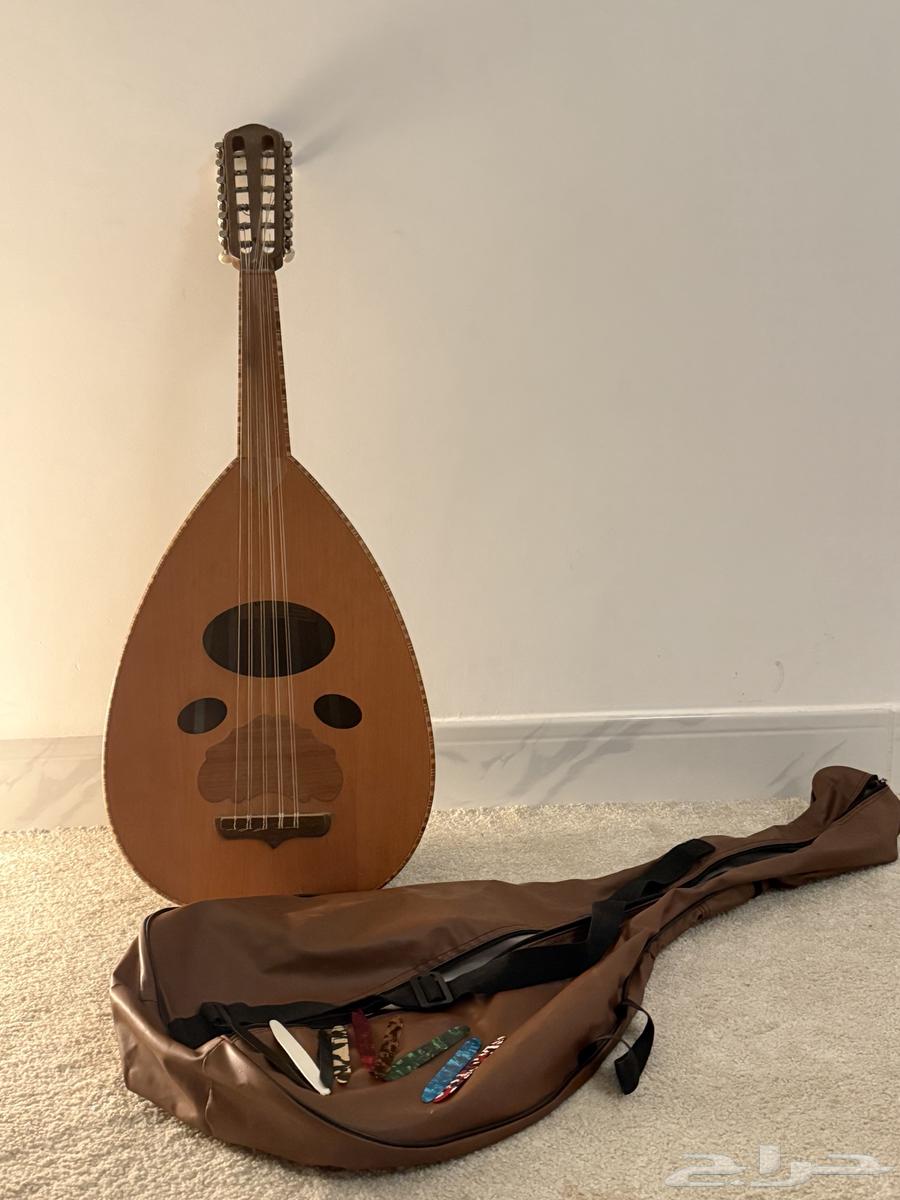 عود زرياب شبه جديد   شنطة جلد وريش64464111305219110