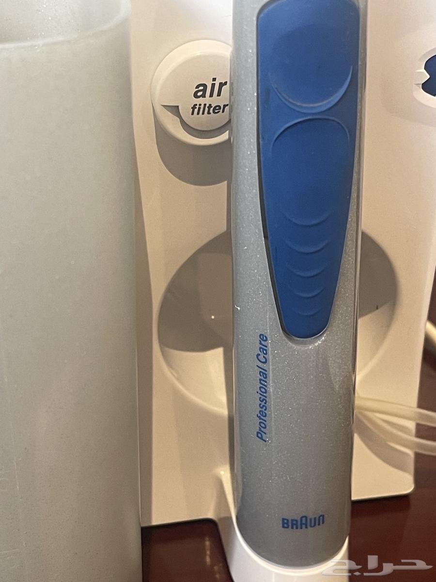 فرشة أسنان كهربائية وبخاخ ماء براون64461843052419114