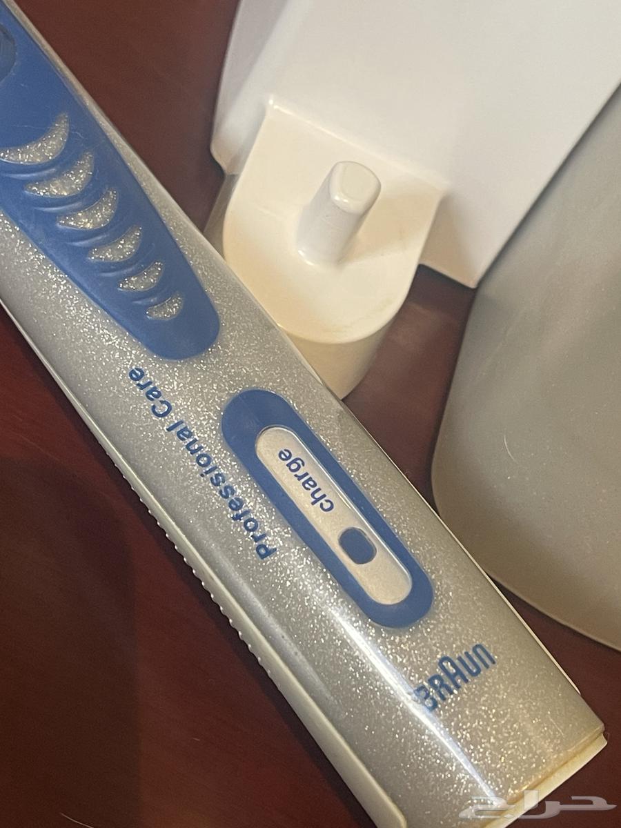 فرشة أسنان كهربائية وبخاخ ماء براون64461843052419113