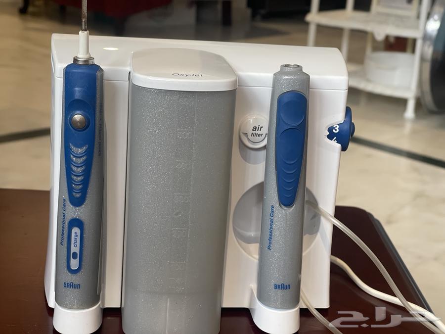 فرشة أسنان كهربائية وبخاخ ماء براون64461843052419110