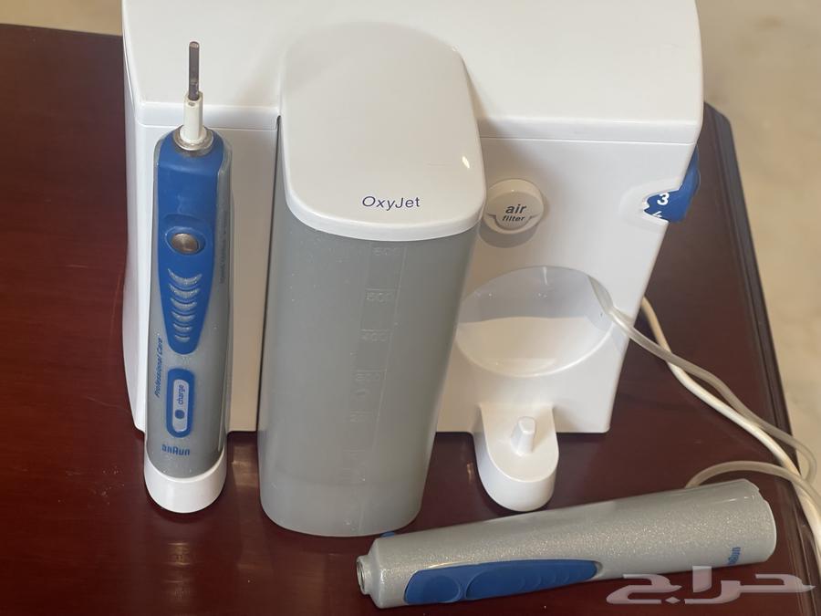 فرشة أسنان كهربائية وبخاخ ماء براون64461843052419112