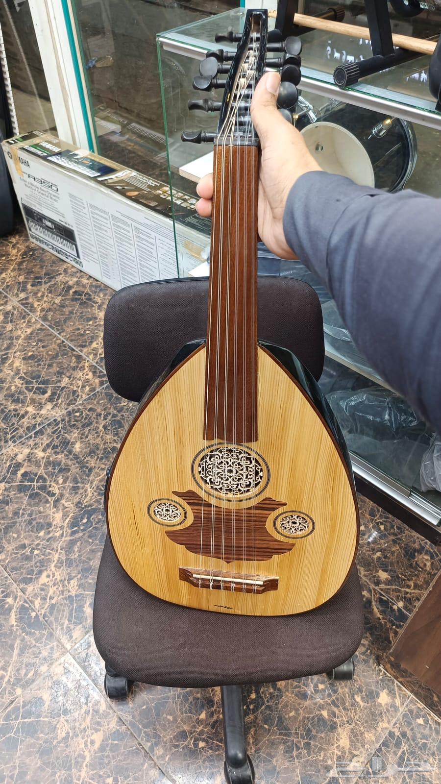 عود موسيقي كهربائي64462117793921112