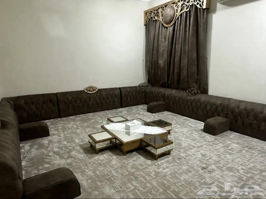 Ground floor majlis with curtain, entrance, and TV table for sale at a reasonable price64468650414721110