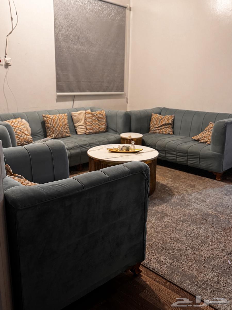 Four-piece sofa with a table and four side tables. There is a slight damage64471430424963111