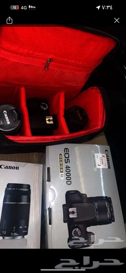 Canon camera with new lens in its original box64469865061889110