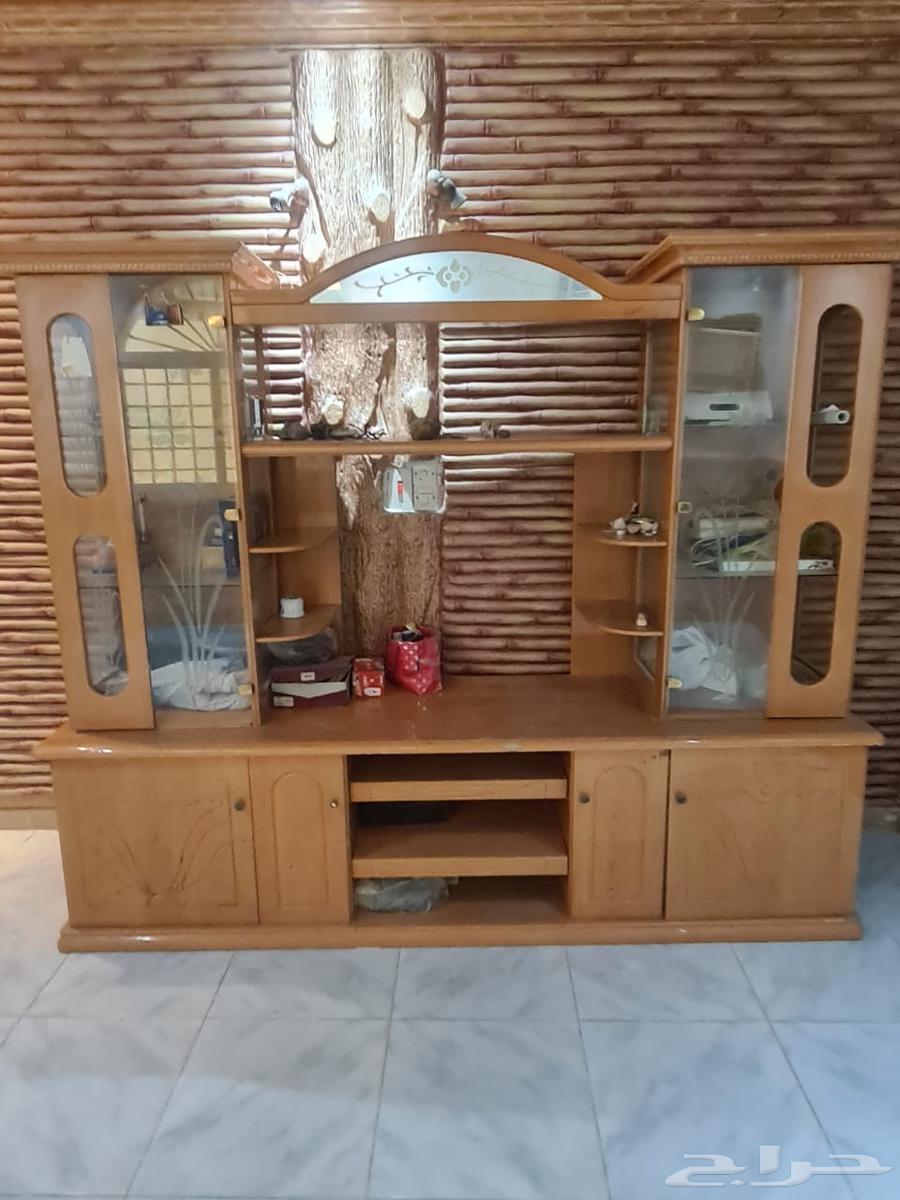 Sofa and table and bookshelf64469487525762111