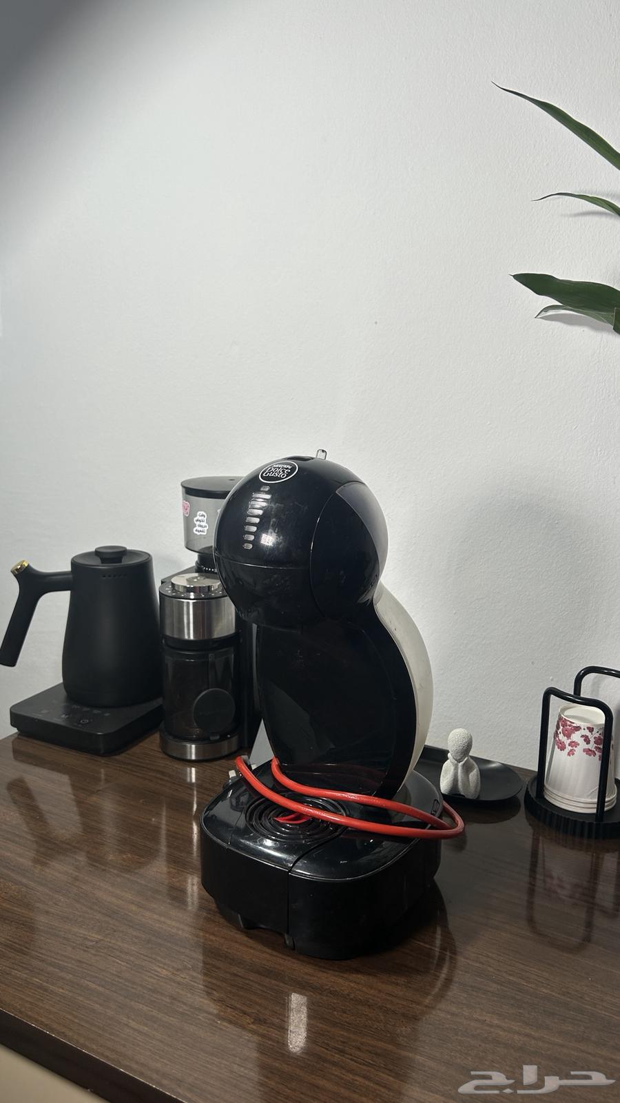 Espresso machine by NUN, capsule machine by Dolce64472741379841112