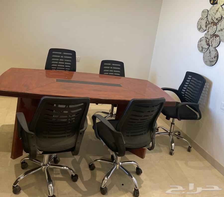 Meeting table with chairs (Al-Saamel communicates with me and give good news)64472954035842112