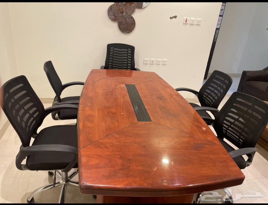 Meeting table with chairs (Al-Saamel communicates with me and give good news)64472954035842110