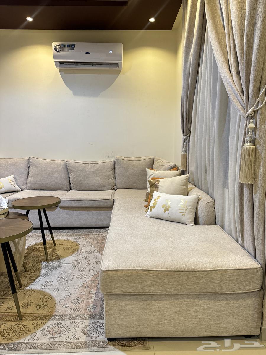 L-shaped hall for sale with carpet, table, and chandelier64478031824257111