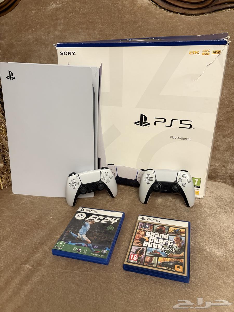 PlayStation 5 with two controllers and FIFA game disc and Grand Theft Auto disc (( Like New )) SD64474790601089110