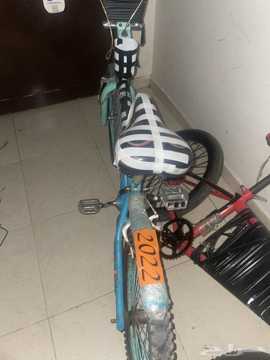 Modified red and light blue bicycle64476670910339111