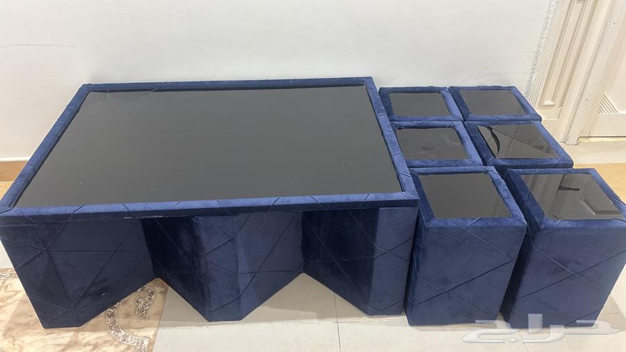 Table one meter long with four service tables 25 centimeters long64477866837378110