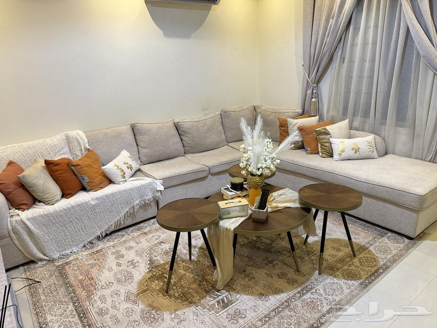 L-shaped hall for sale with carpet, table, and chandelier64478031824257114