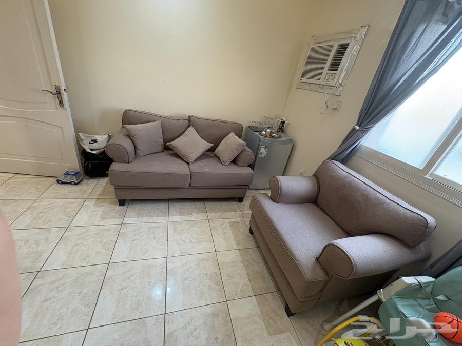 أريكة وتلفزيون ووحدة تلفاز64471718687619110