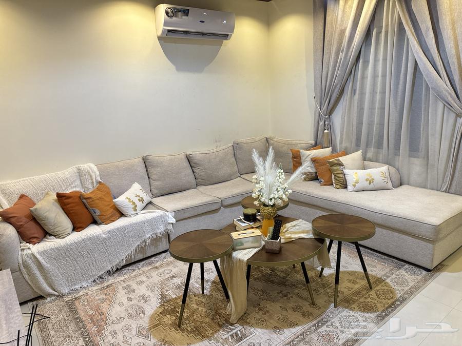 L-shaped hall for sale with carpet, table, and chandelier64478031824257113