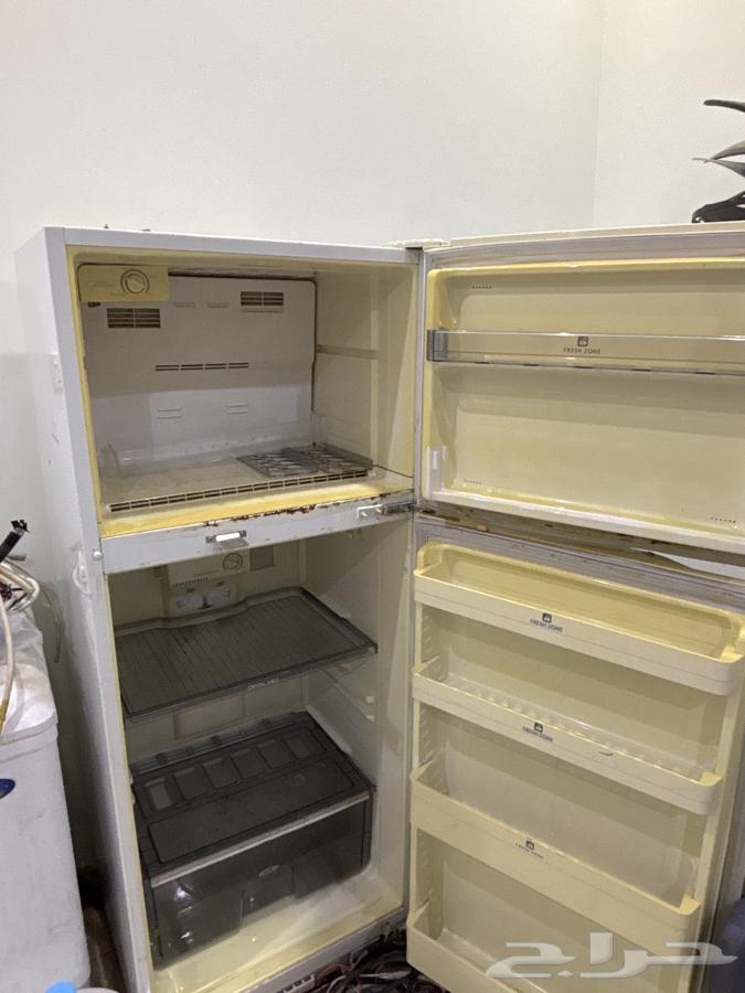 Two large refrigerators64476963066370110