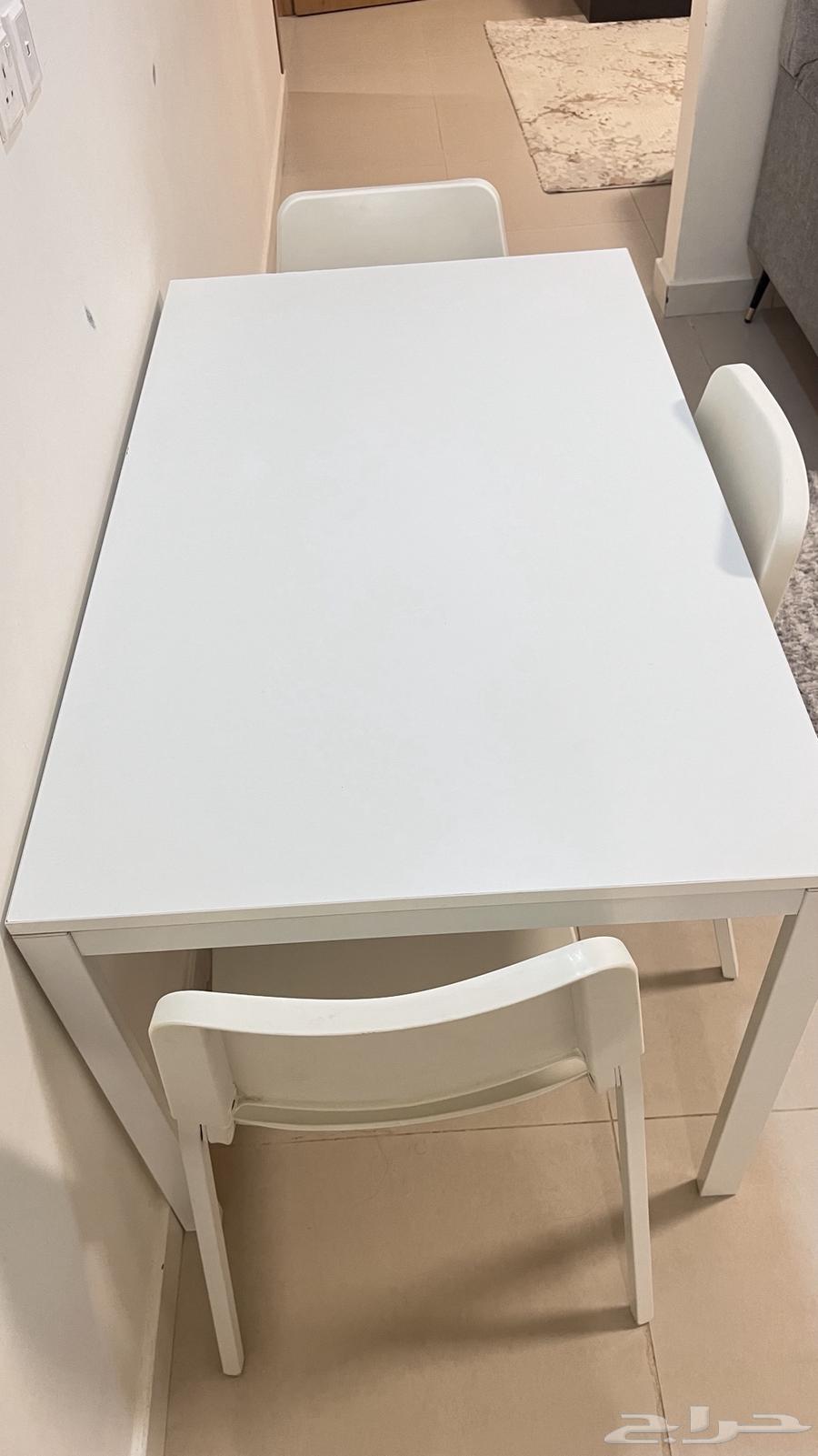 Dining table and three chairs64484157245443110