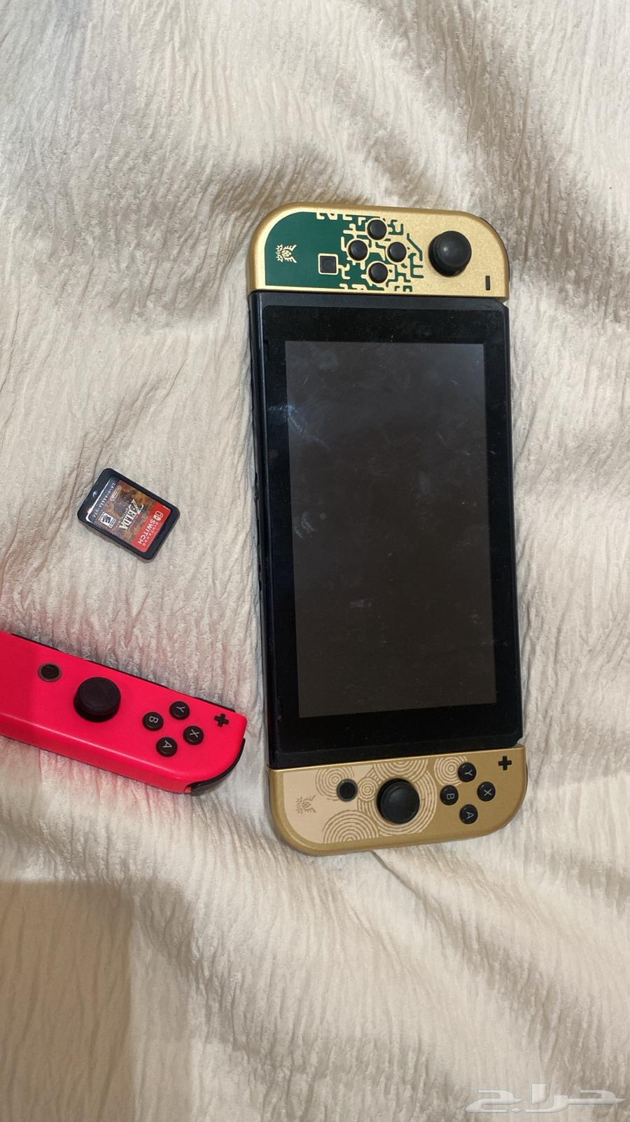 Nintendo switch v2 Zelda with Zelda and pink controller64481613067521113