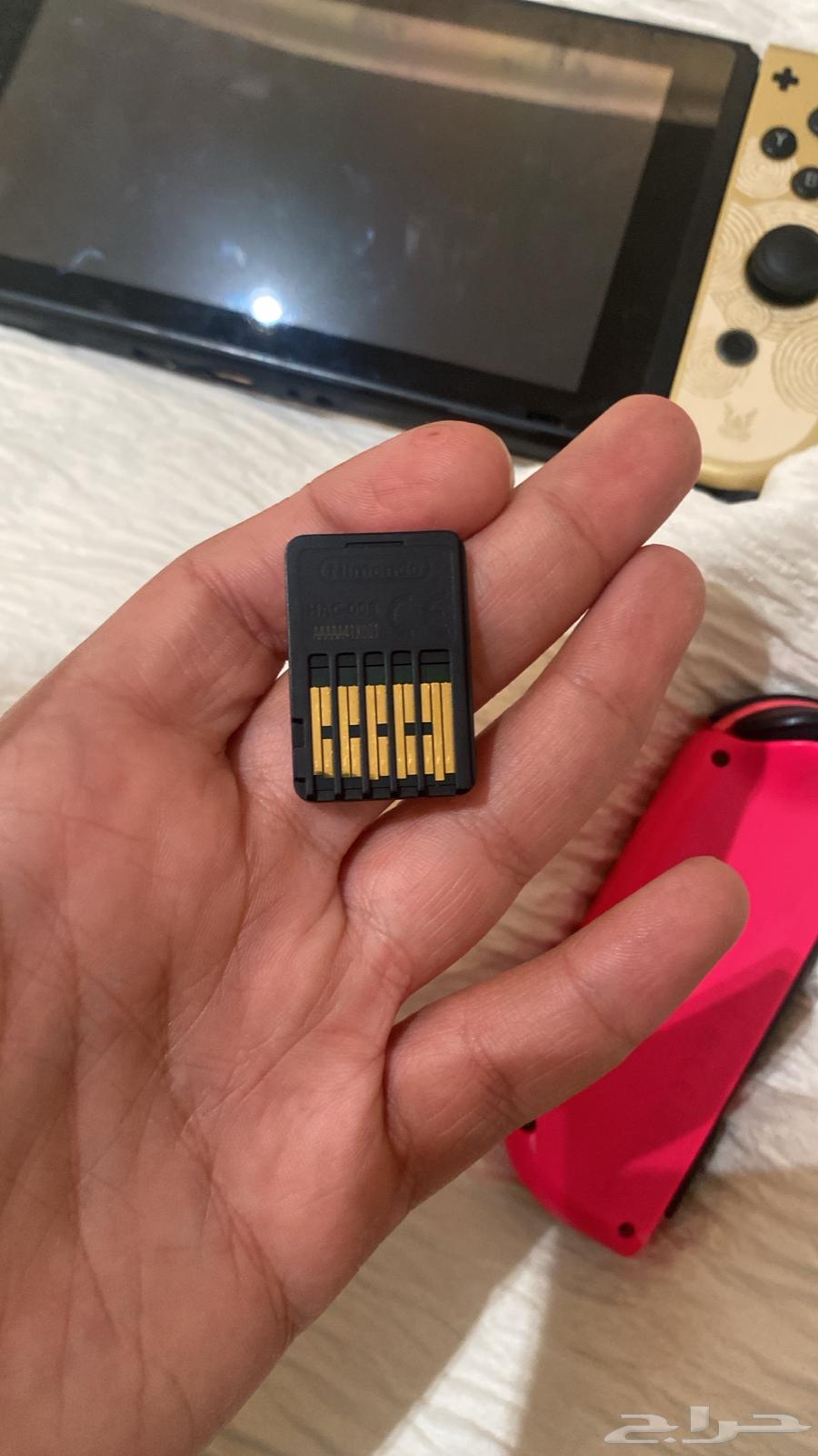 Nintendo switch v2 Zelda with Zelda and pink controller64481613067521112