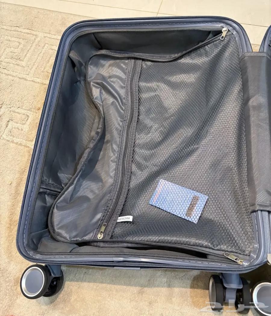 حقيبة السفر شعار سيفين ونخلة64484911478785113