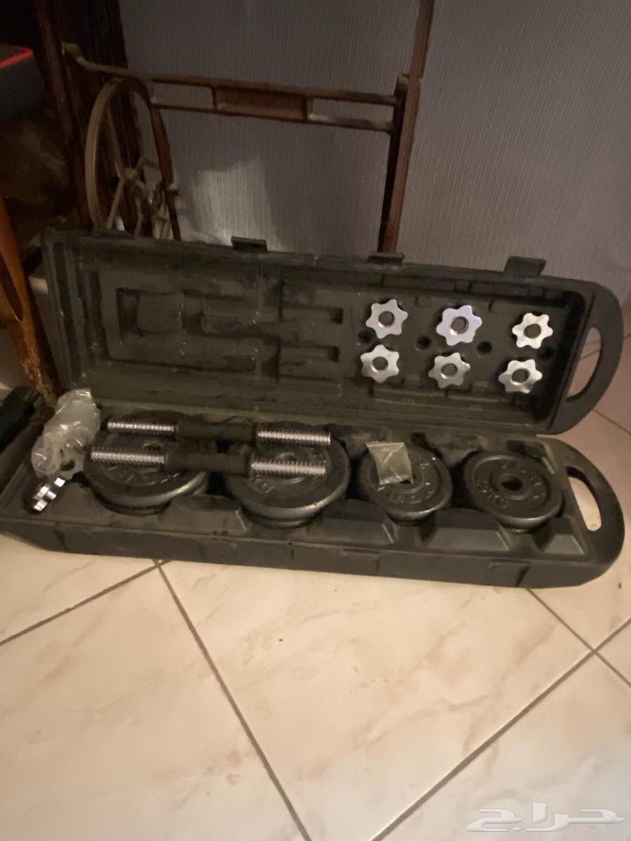 Iron weights with exercise chair64485639843969110