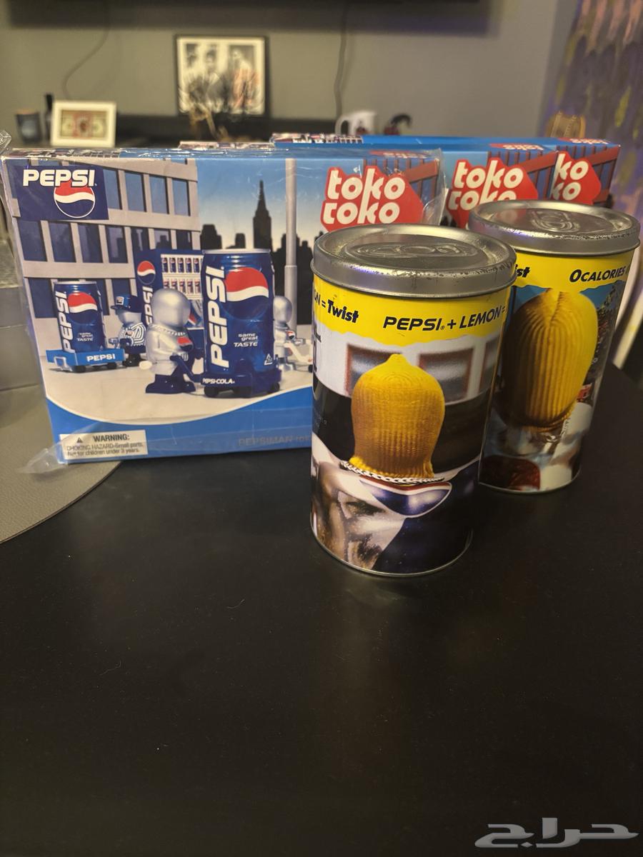 A collection of PepsiMan products produced between 1999-2000, stored64479120108930113