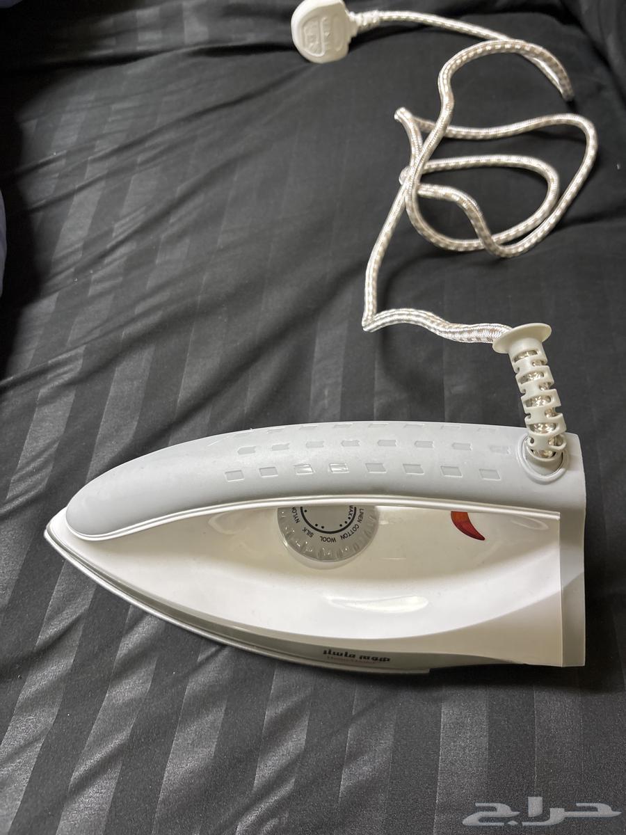 A regular iron used only once, its box is available64485584364803110