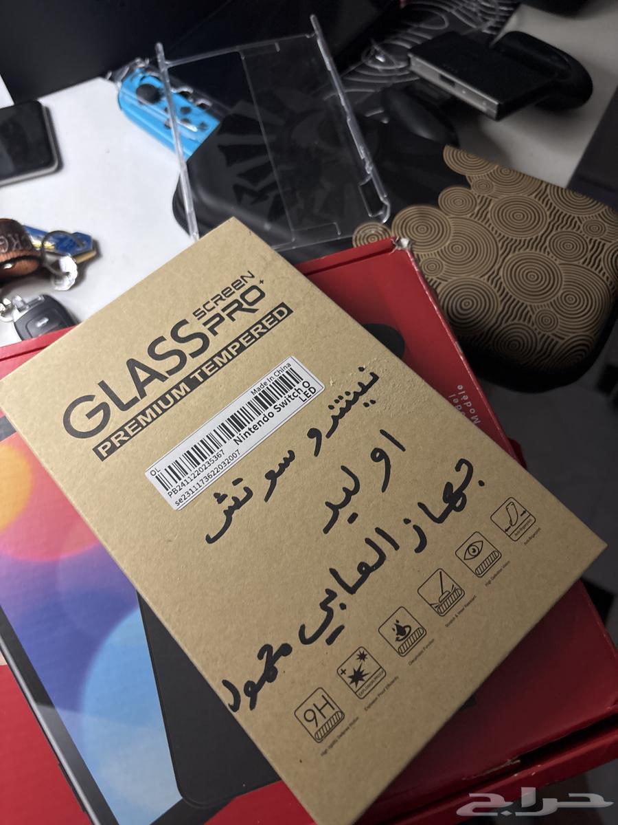 Used OLED Switch with two games64483437872770114