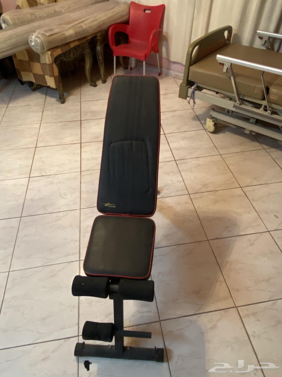 Iron weights with exercise chair64485639843969113