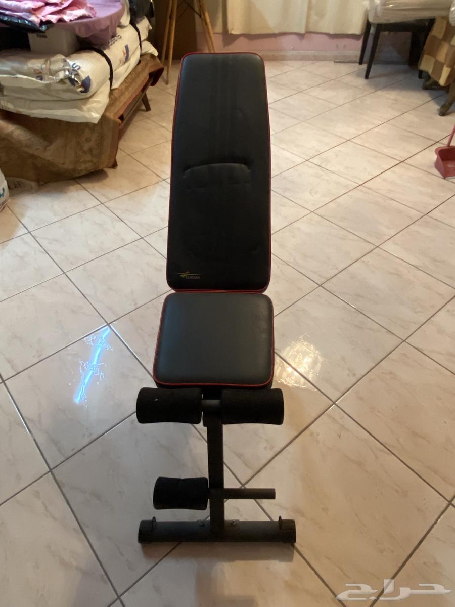 Iron weights with exercise chair64485639843969111